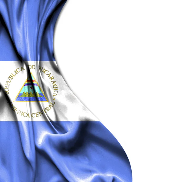 흰색 배경에 고립 새틴 깃발을 흔들며 니카라과 — 스톡 사진