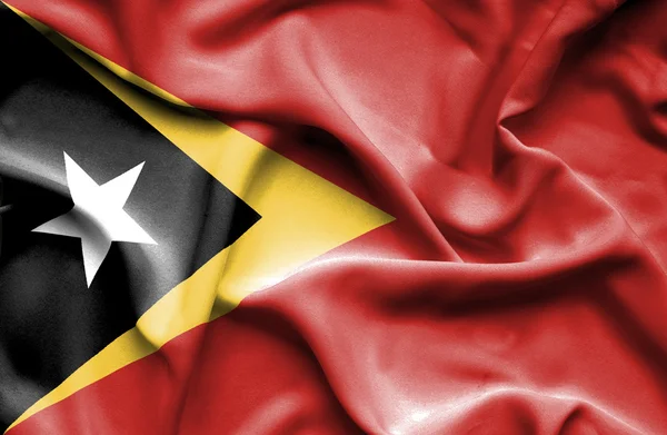 Timor Oriental ondeando bandera —  Fotos de Stock