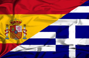 Yunanistan ve İspanya bayrağı sallayarak