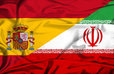 iran ve İspanya bayrağı sallayarak