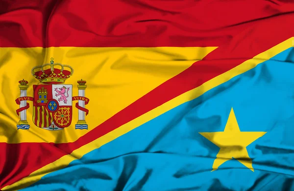 Waving flag of Congo Democratic Republic and Spain — Stock Photo, Image