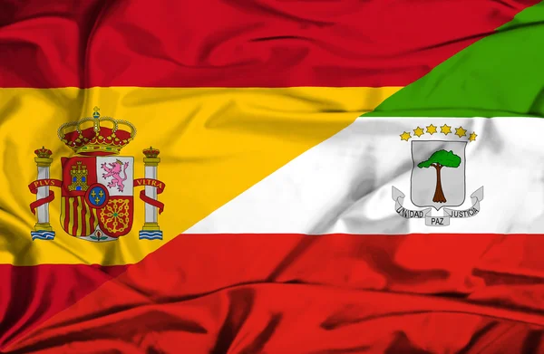 Flagge von Äquatorialgiuinea und Spanien schwenkend — Stockfoto