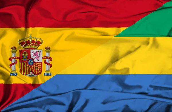 Waving flag of Gabon and Spain — Stock Photo, Image