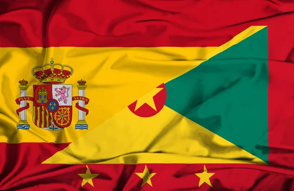 Machać flaga guernsey i Hiszpania — Zdjęcie stockowe