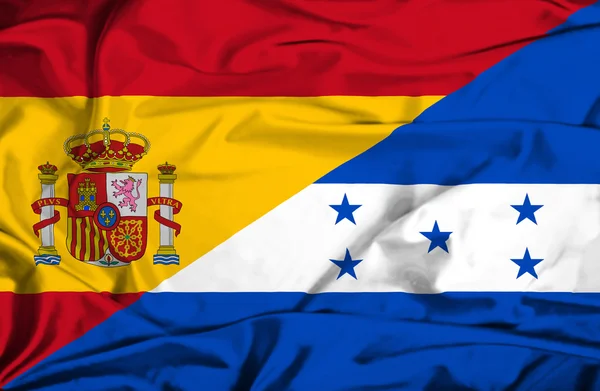 Machać flaga Hondurasu i Hiszpania — Zdjęcie stockowe