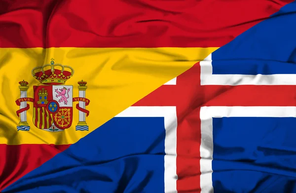 Bandiera sventolante di Islanda e Spagna — Foto Stock
