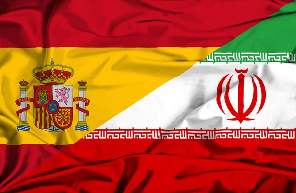 Waving flag of Iran and Spain — Stock Photo, Image
