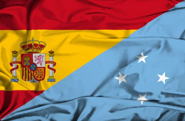 Waving flag of Micronesia and Spain — Stock Photo, Image