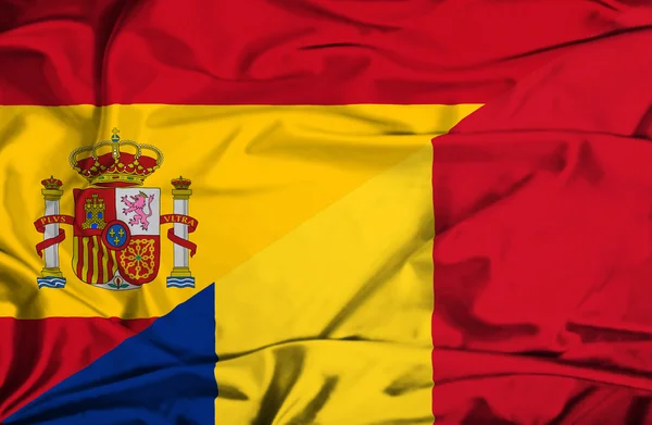 Flagge Rumäniens und Spaniens schwenken — Stockfoto