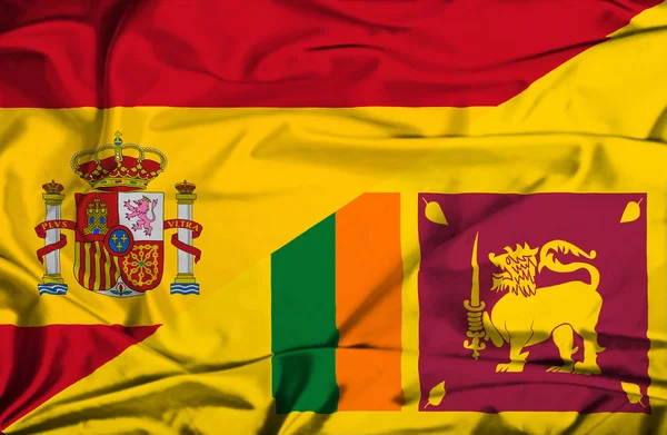 Waving flag of Sri Lanka and Spain — Stock Photo, Image