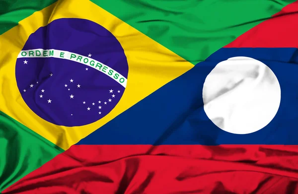 Integetett zászló Laosz és Brazília — Stock Fotó