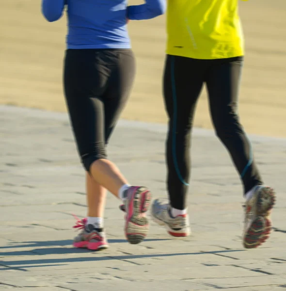 People running with motion blur effect — Stock Photo, Image
