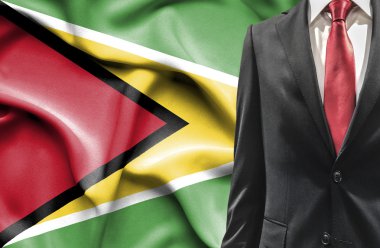 Guyana gelen takım elbiseli adam