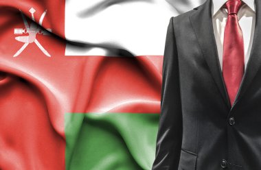 Umman üzerinden takım elbiseli adam