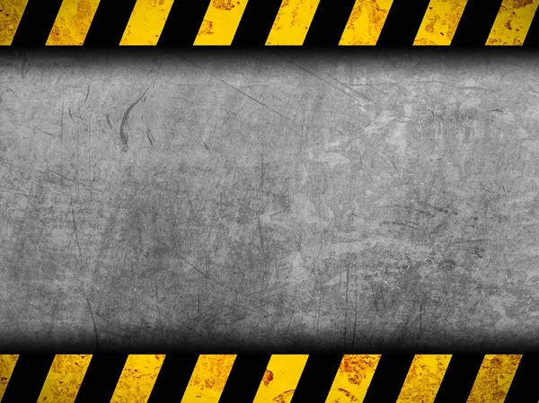 Grunge metal background with black and yellow warning stripes — Stock Photo, Image