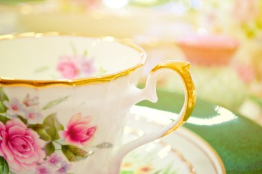 Antique floral tea set macro shot clipart