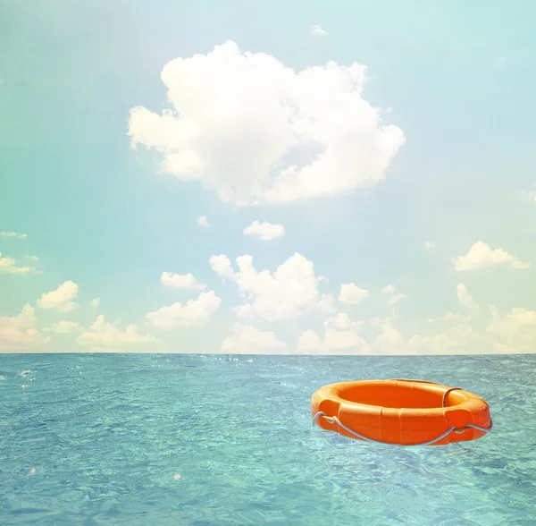 Help concept - Life buoy at open sea — Stock Photo, Image
