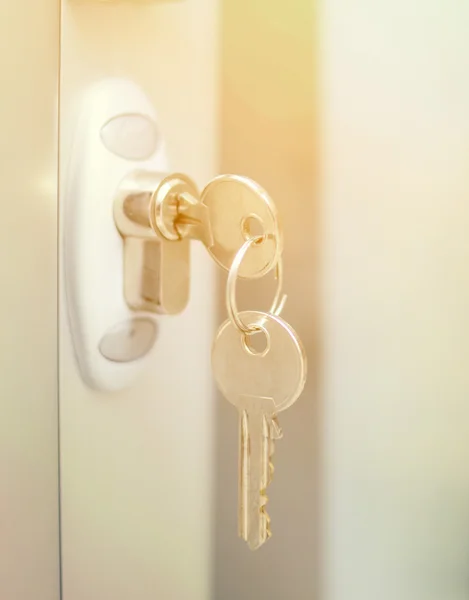 Door lock witj keys macro shot - Real estate concept — Stock Photo, Image