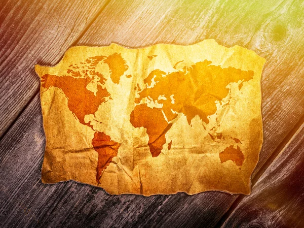 Old world map over wooden background — Stock Photo, Image