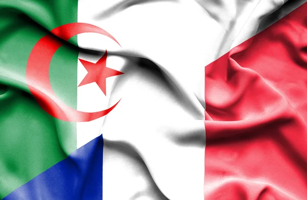 Waving flag of France and Algeria — Stock Photo, Image