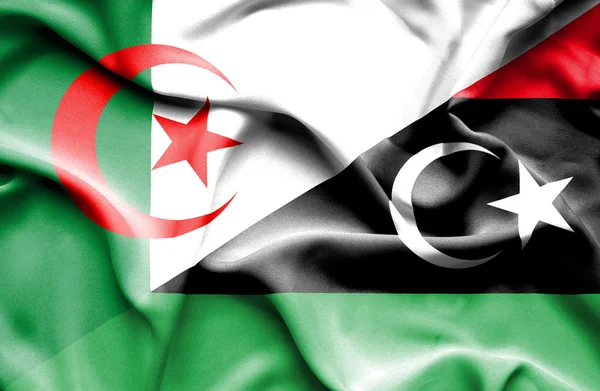 Wapperende vlag van Libië en Algerije — Stockfoto