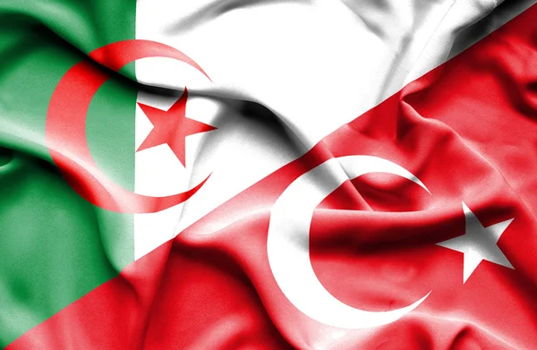 Waving flag of Turkey and Algeria — Stock Photo, Image