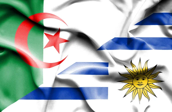 Bandera ondeante de Uruguay y Argelia — Foto de Stock