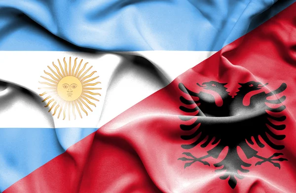 Wapperende vlag van Albanië en Argentinië — Stockfoto