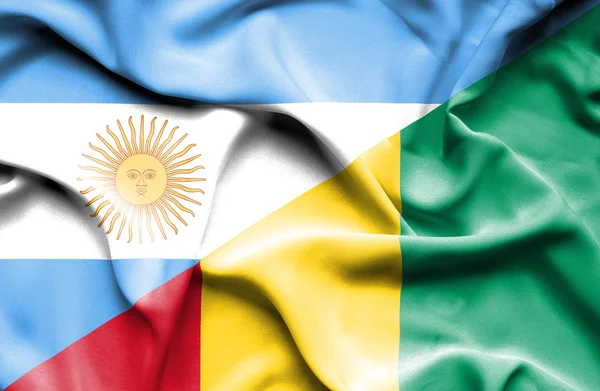 Wapperende vlag van Guinee en Argentinië — Stockfoto