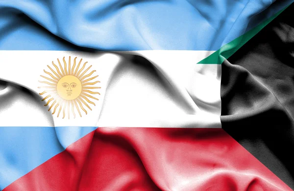 Flagge von Kuwait und Argentinien schwenken — Stockfoto