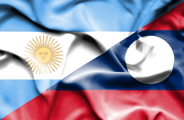 Viftande flagga Laos och Argentina — Stockfoto