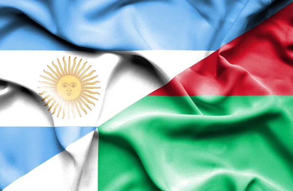Machać flaga Madagaskaru i Argentyna — Zdjęcie stockowe