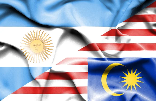 Waving flag of Malaysia and Argentina