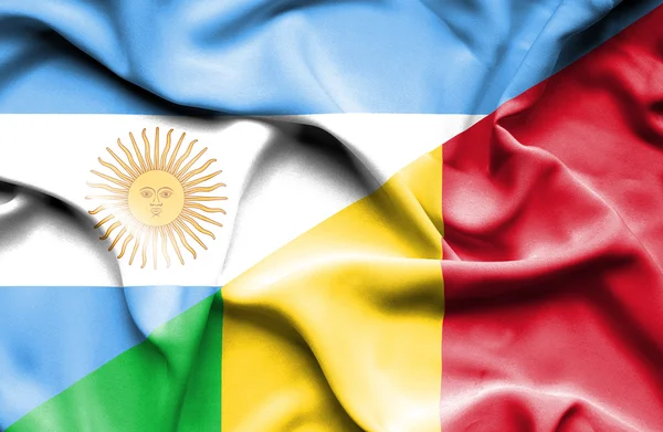 Waving flag of Mali and Argentina — Stock Photo, Image