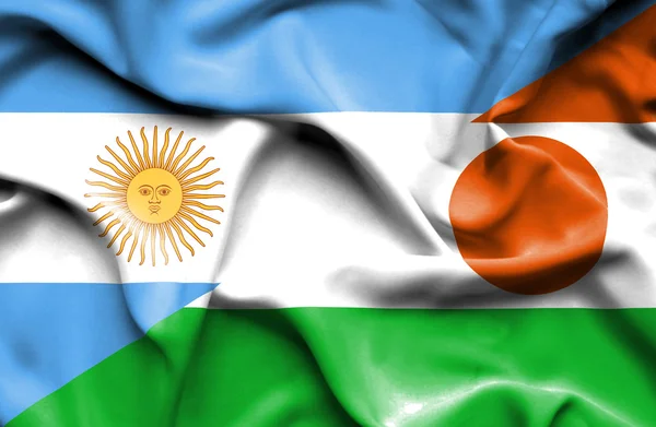 Wapperende vlag van Niger en Argentinië — Stockfoto
