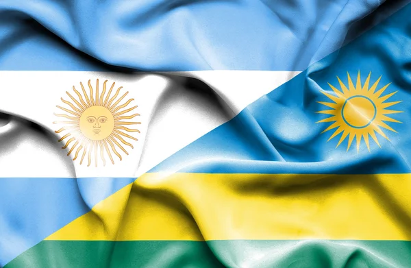 Flagge Ruandas und Argentiniens schwenken — Stockfoto