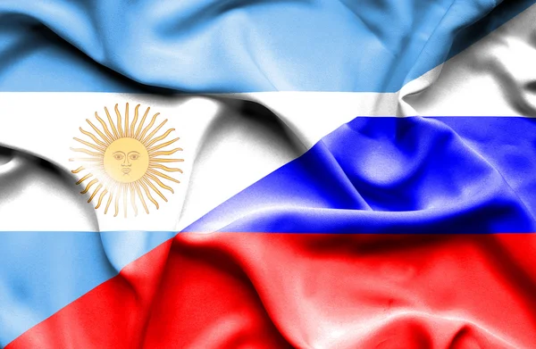 Waving flag of Russia and Argentina — Stock Photo, Image