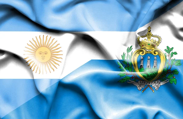 Waving flag of San Marino and Argentina — Stock Photo, Image