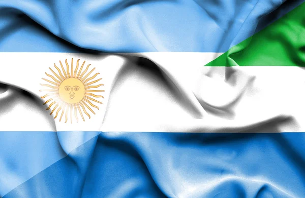 Waving flag of Sierra Leone and Argentina — Stock Photo, Image