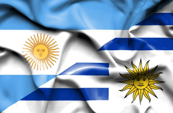 Waving flag of Uruguay and Argentina — Stock Photo, Image