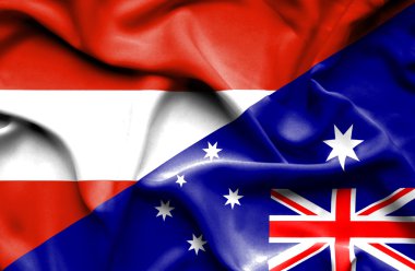 Avustralya ve Avusturya bayrağı sallayarak 