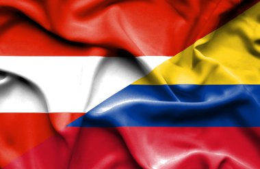 Columbia ve Avusturya bayrağı sallayarak