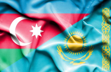 Kazakistan ve Azerbaycan bayrağı sallayarak
