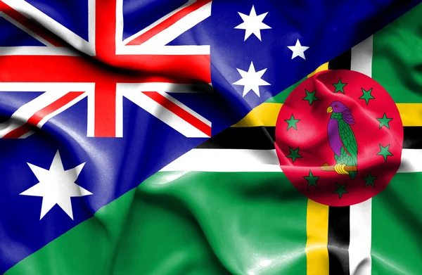 ドミニカ国・ オーストラリアの旗を振っています。 — ストック写真