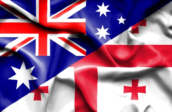 Waving flag of Georgia and Australia — Stock Photo, Image