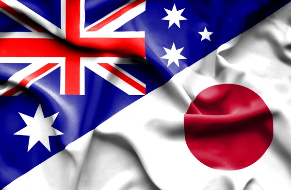 Waving flag of Japan and Australia — Stock Photo, Image
