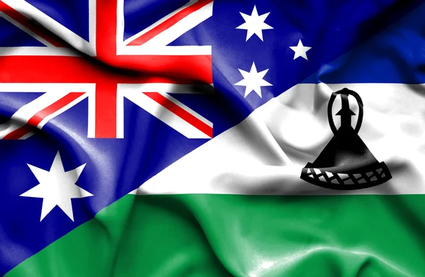 Wapperende vlag van Lesotho en Australië — Stockfoto