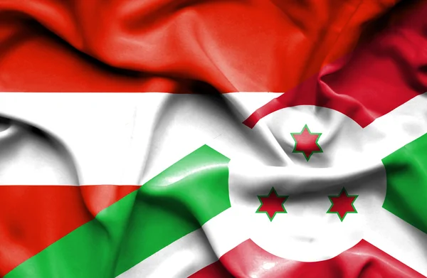 Waving flag of Burundi and Austria — Stock Photo, Image