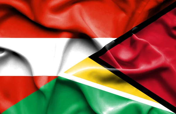 Bandeira acenando da Guiana e Áustria — Fotografia de Stock