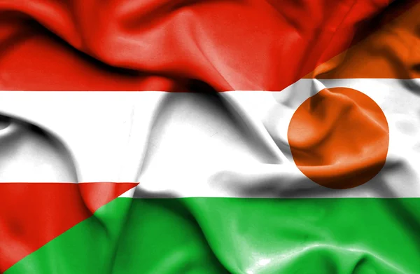 Wapperende vlag van Niger en Oostenrijk — Stockfoto